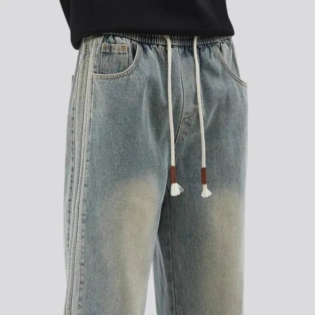 Faded wash and 90s style men's denim joggers