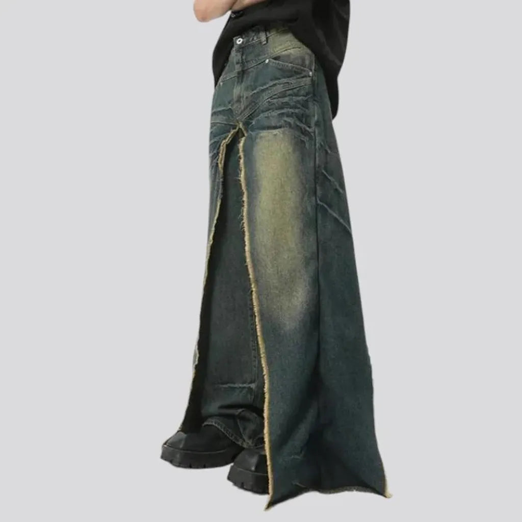 Distressed men's layered jeans