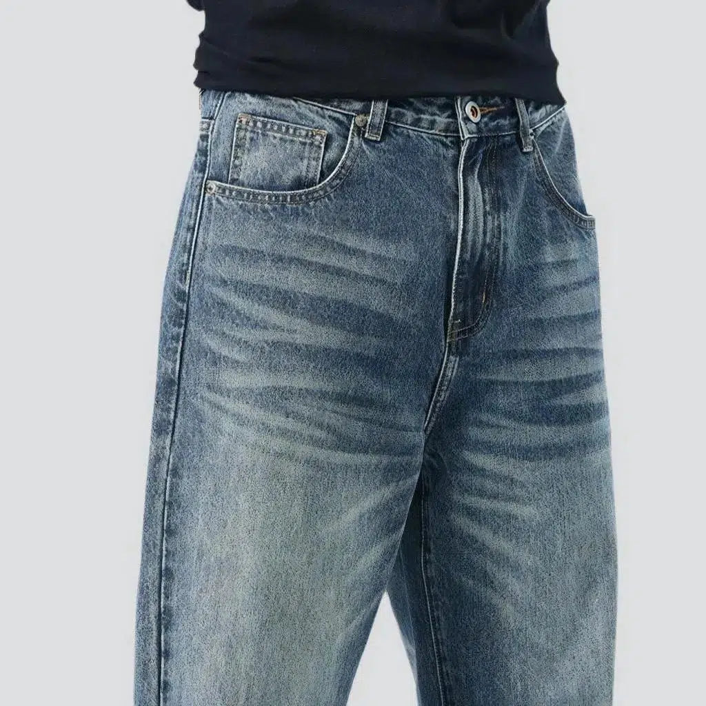 Sanded men's medium-wash jeans