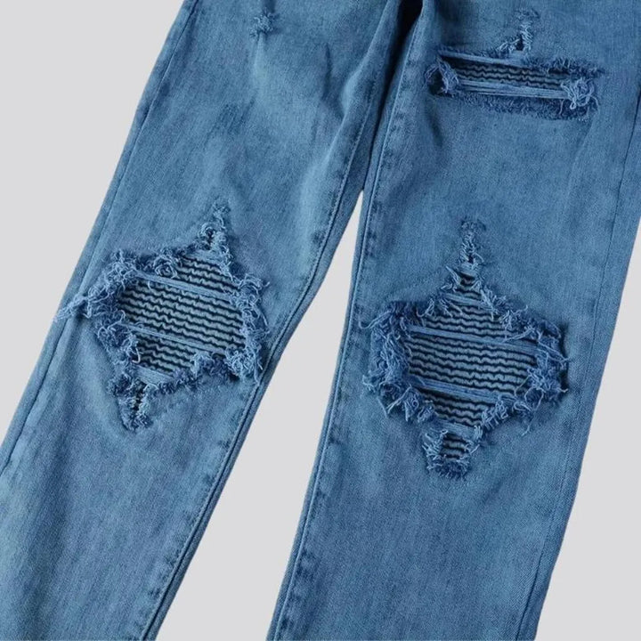 Distressed mid rise men's jeans