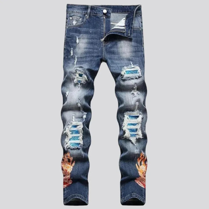 Whiskered men's embroidered jeans