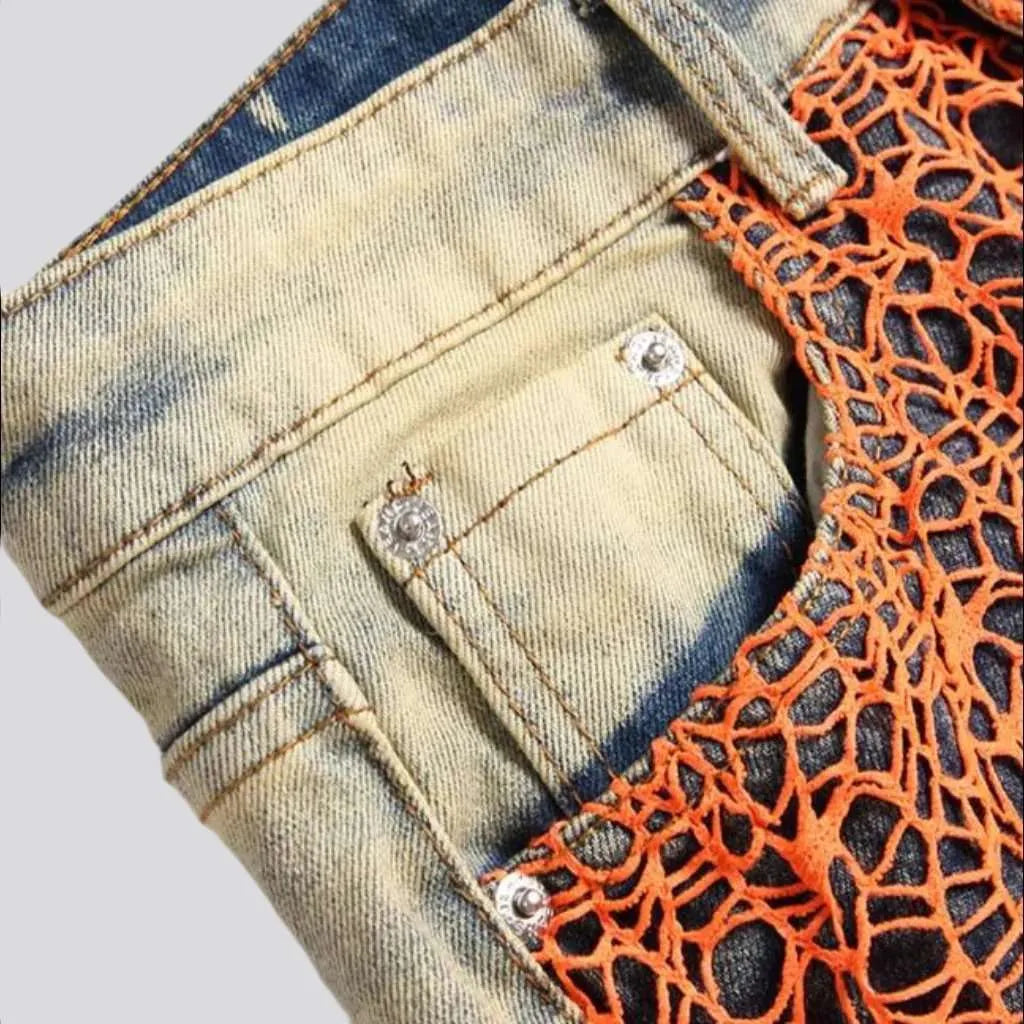 Orange all-over embroidery jeans