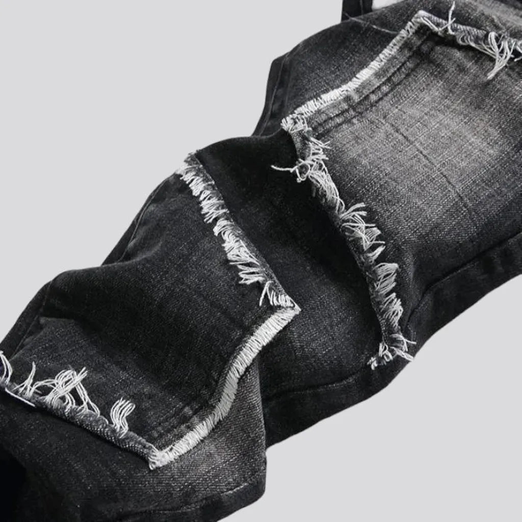 Damaged men's mid-waisted jeans