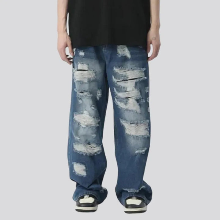 Medium-wash men's floor-length jeans