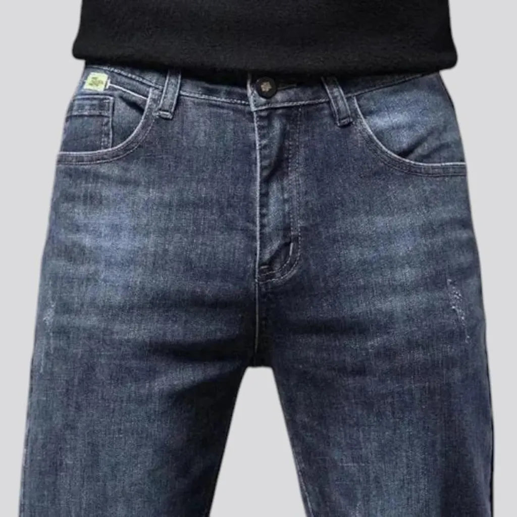 Elastic dark padded jeans for men