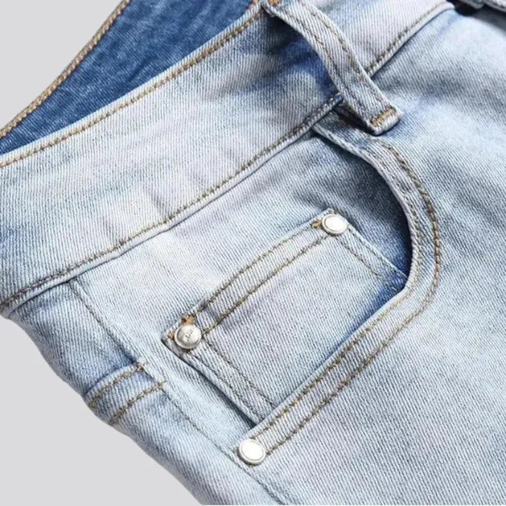 Light-wash color-patches jeans