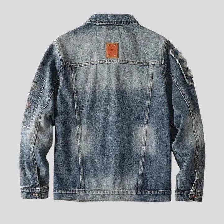 Distressed men's jean jacket