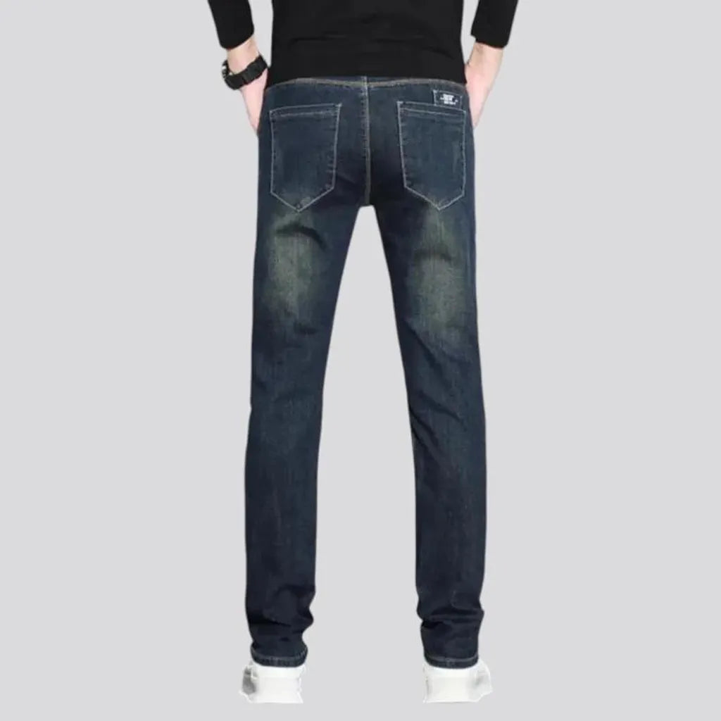 Mid rise elastic dark men's jeans