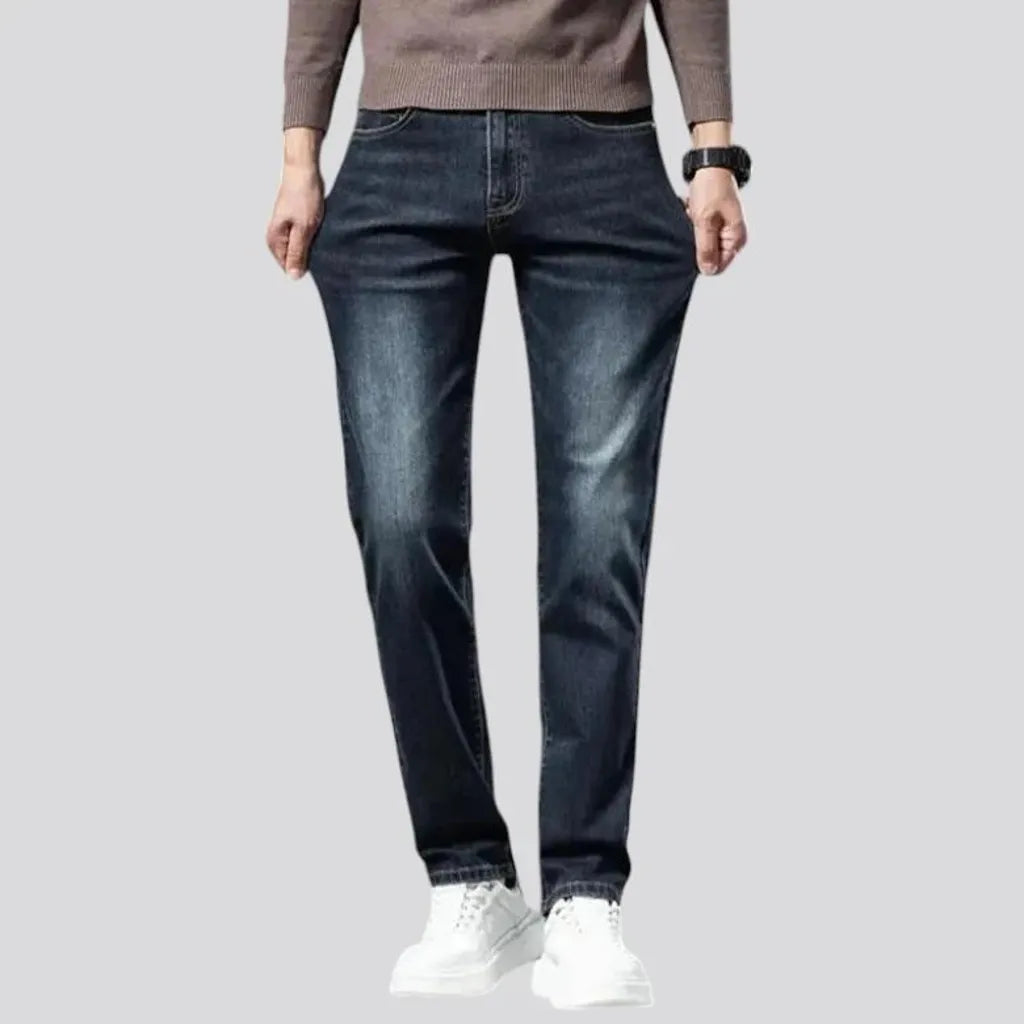 Stretchable dark fading jeans for men