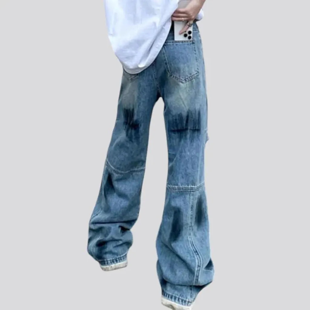 Distressed light wash men's jeans