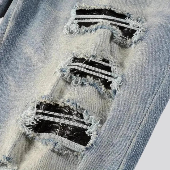 Fashionable ripped men's jeans