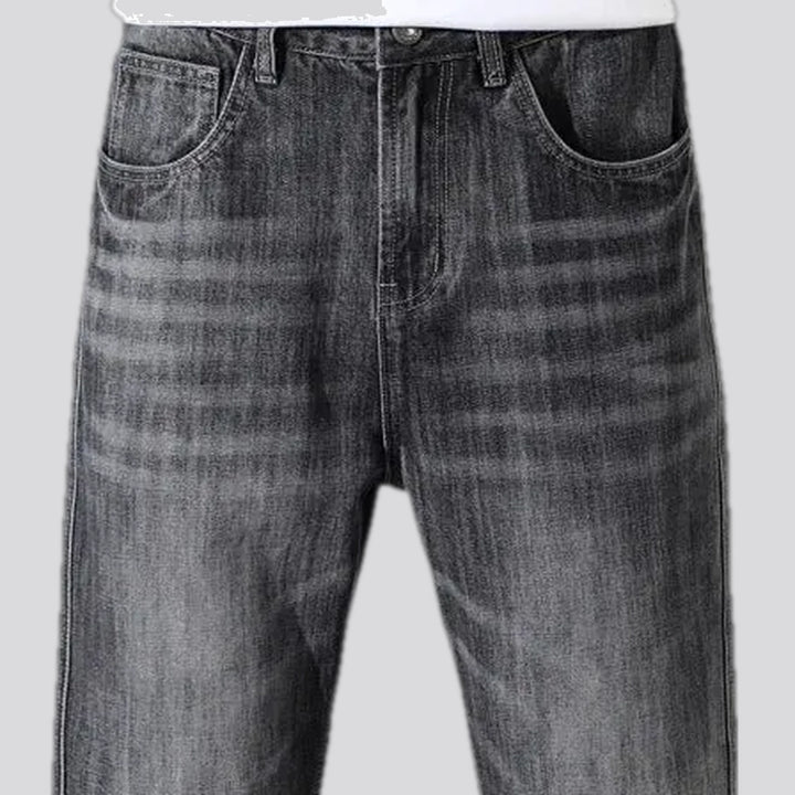 Abraded stonewashed casual men's jeans