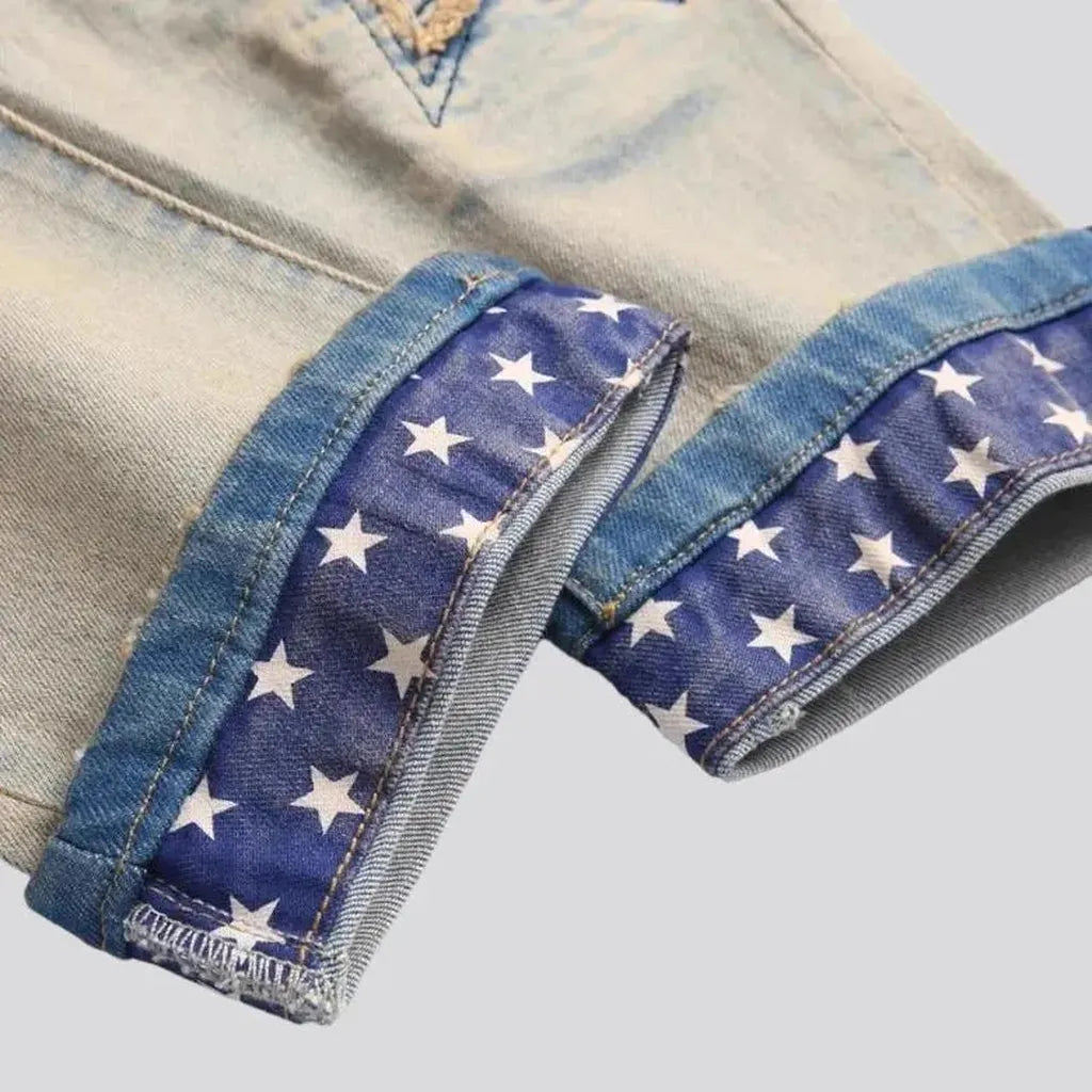 Yellow-cast stars-embroidery jeans
 for men