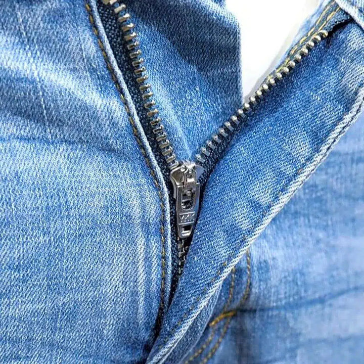 Men's paint-splattered jeans
