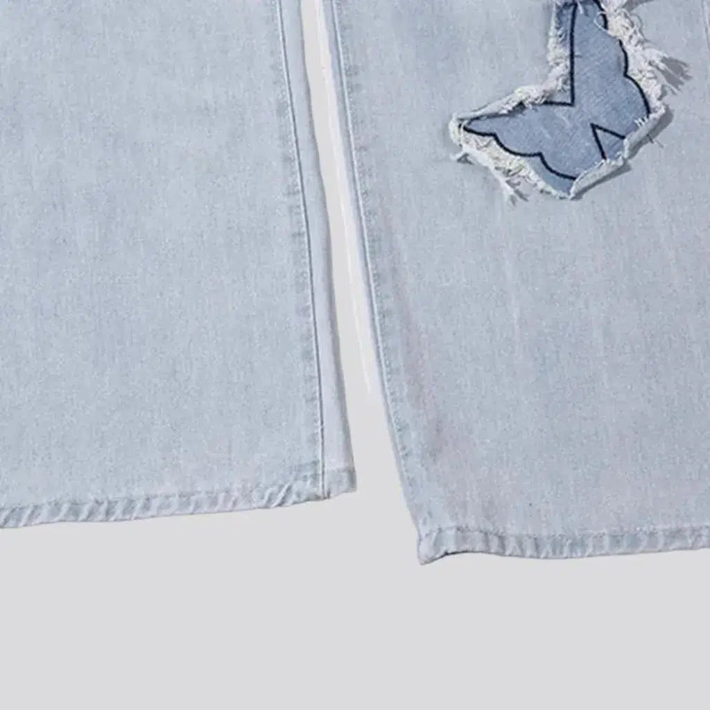 Light-wash butterfly-embroidery jeans