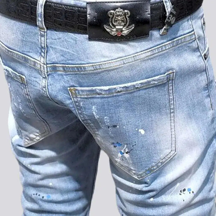 Men's paint-splattered jeans