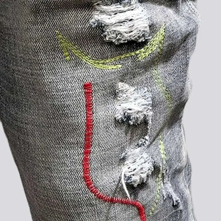 Embroidered men's vintage jeans