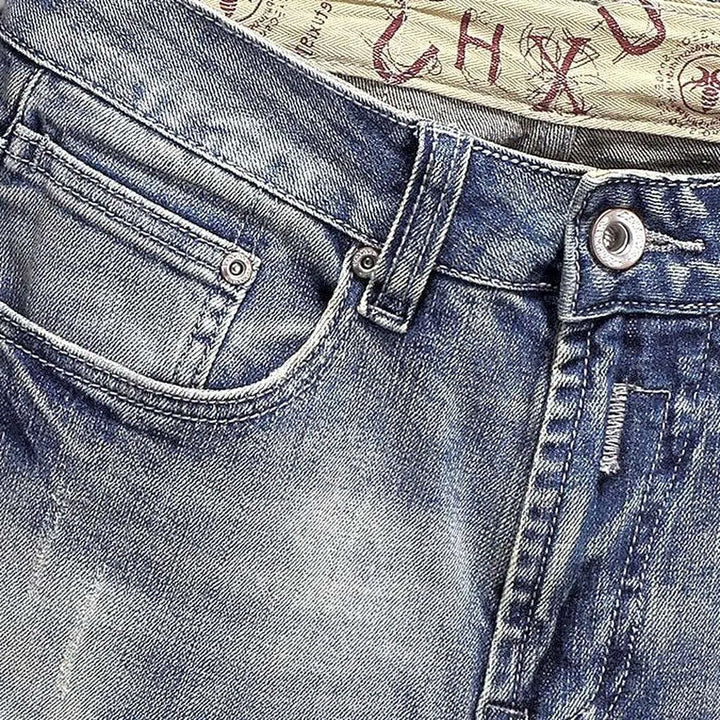 Slightly men's torn jeans
