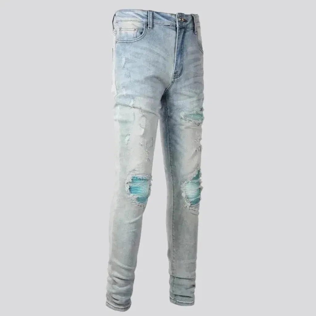 Grunge men's light-wash jeans
