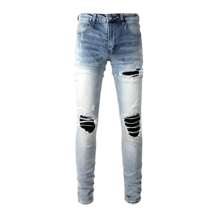 Black-patch whiskered jeans