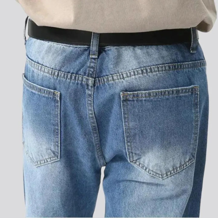 Sanded light wash jeans
 for men