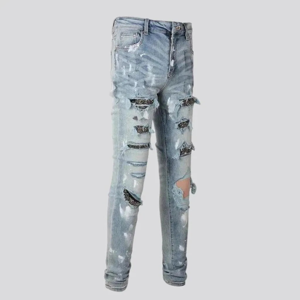 Tight men's frayed jeans