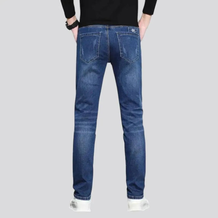 Dark abraded slim fit men's jeans