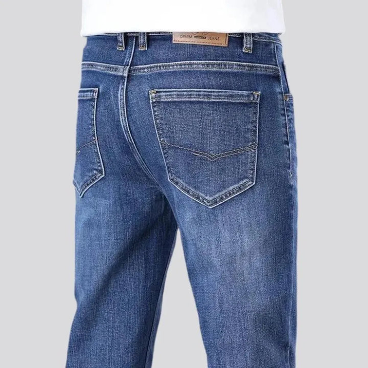 High rise tapered men's jeans