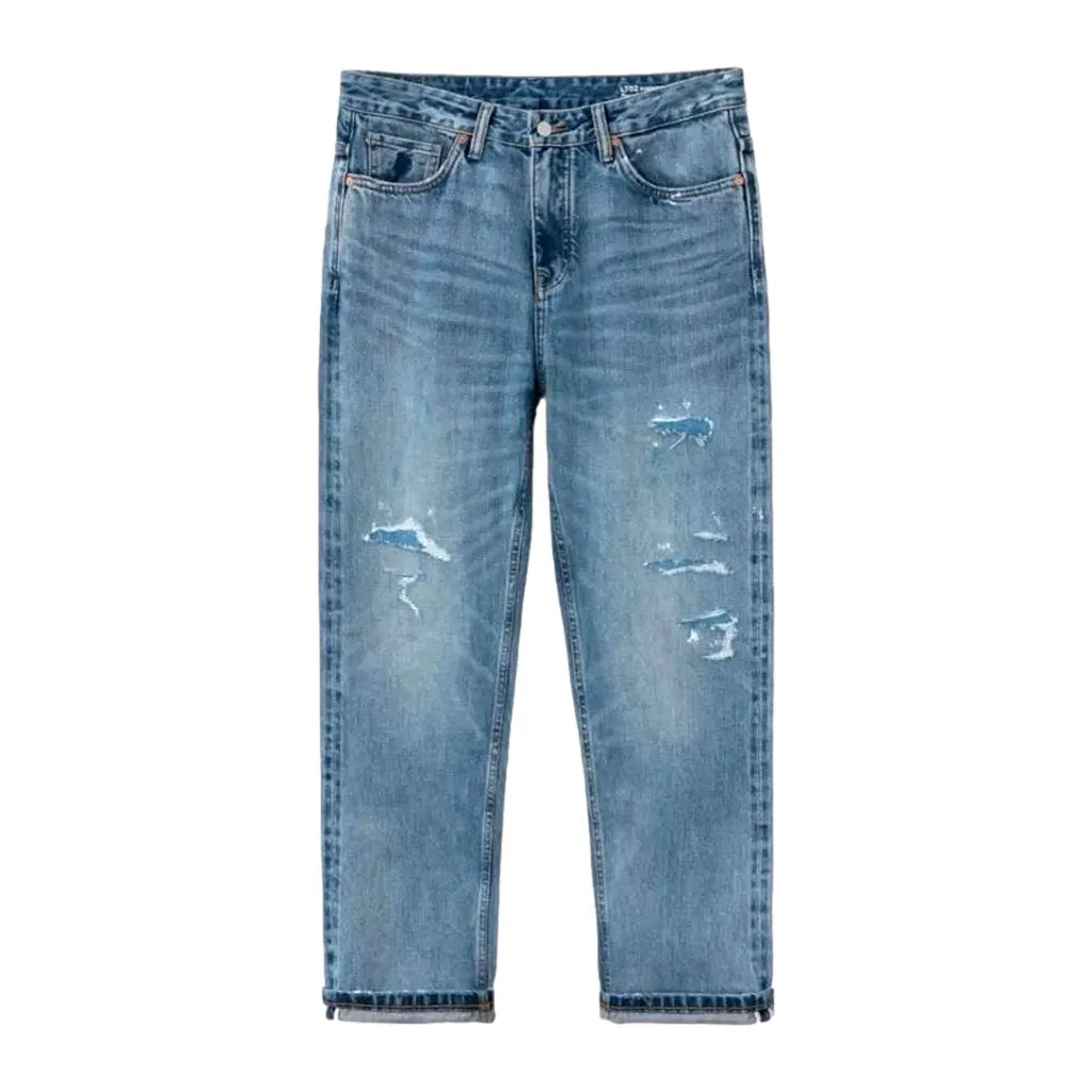 Distressed men's self-edge jeans