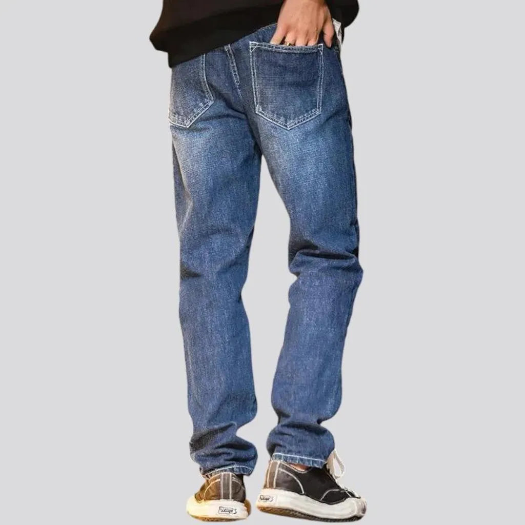 Stonewashed back-cinch tapered men's jeans