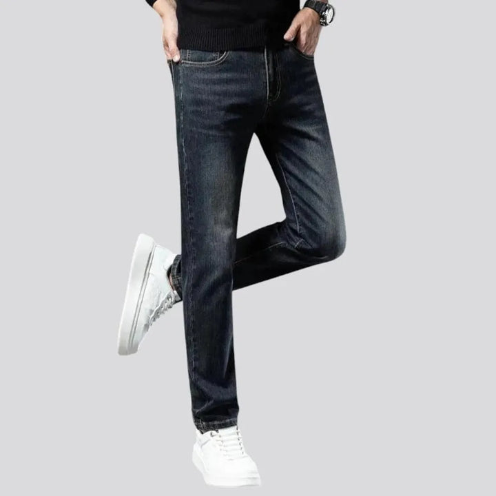 Stretchable dark fading jeans for men