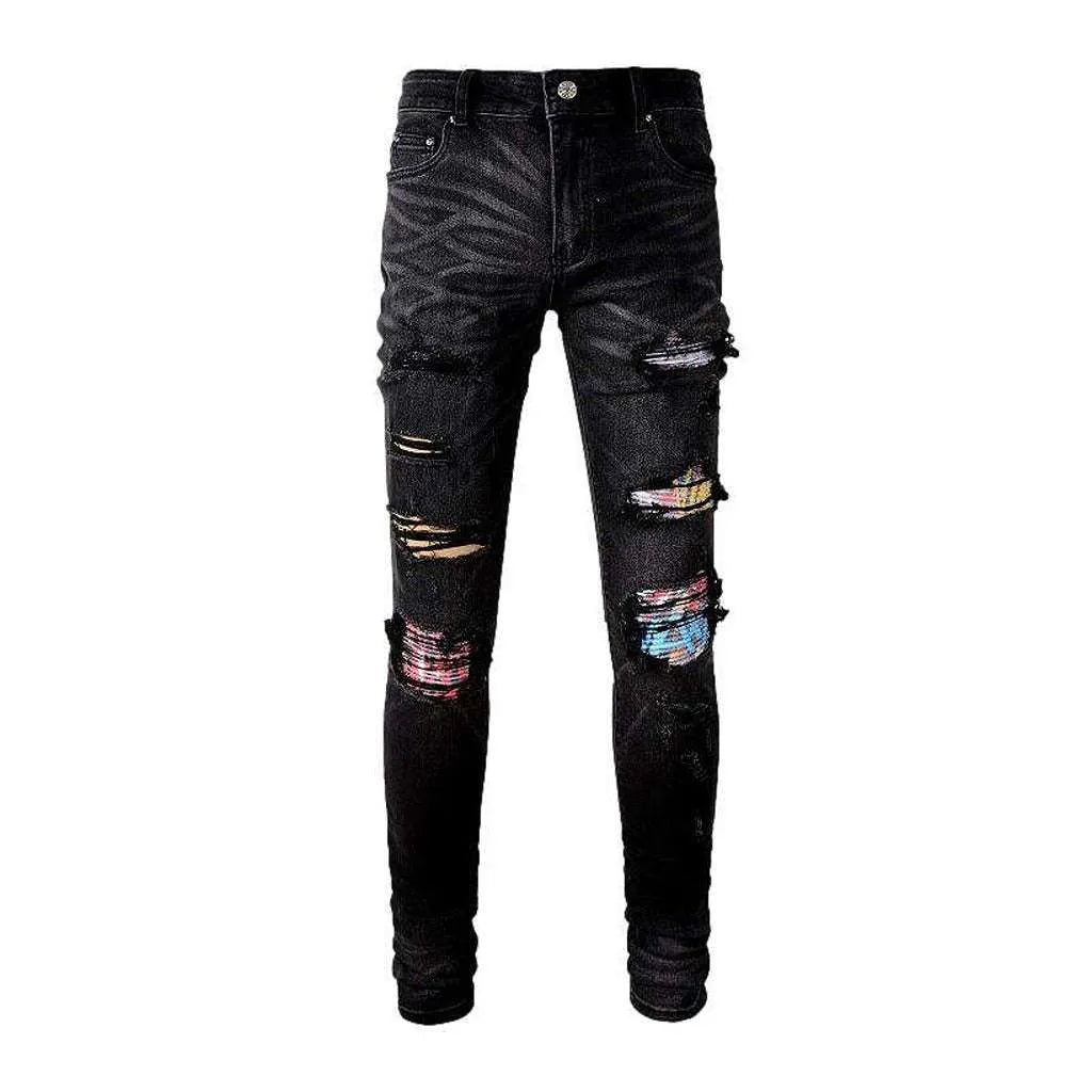 Graffiti print patchwork biker jeans