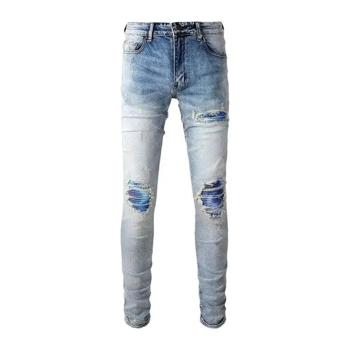 Light-wash distressed jeans