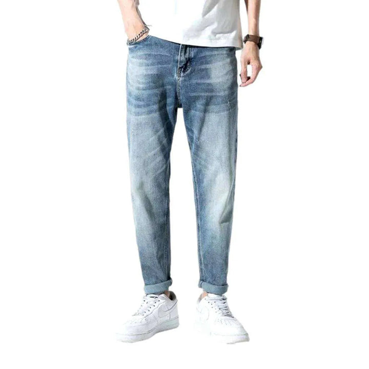 Mid-waist men's medium-wash jeans