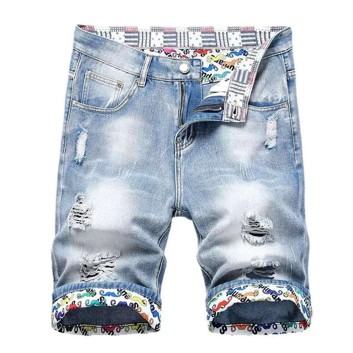 Painted hem ripped denim shorts