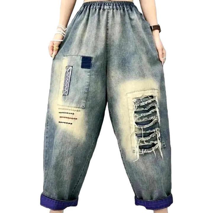 Sanded distressed jeans pants for women