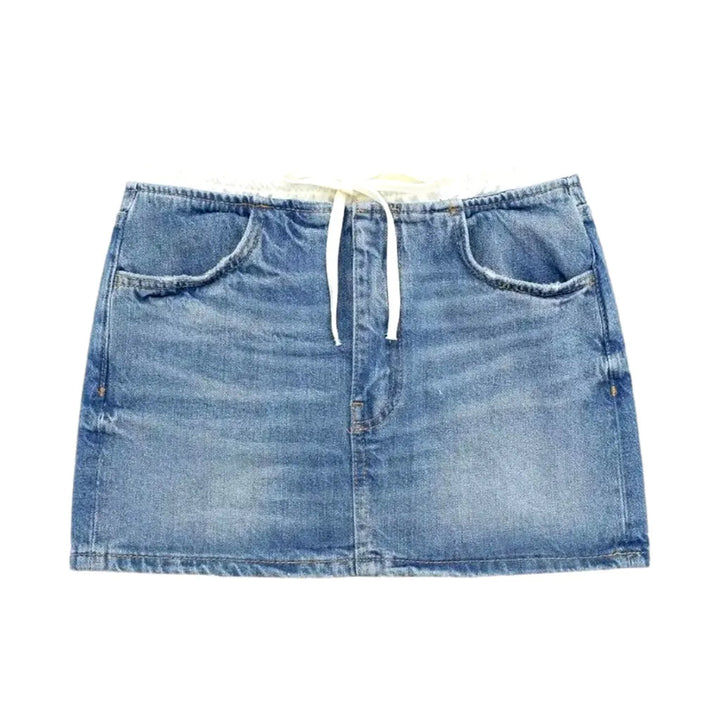 Whiskered light-wash women's denim skirt